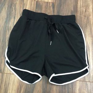 Black shorts with white accents workout shorts or casual
